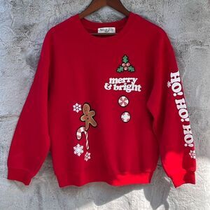 Never worn “Wound Up” Xmas sweatshirt Size Large (11-13)